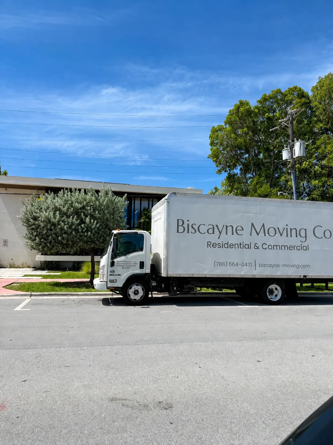 Biscayne Moving Co. truck parked outside a Hallandale Beach home