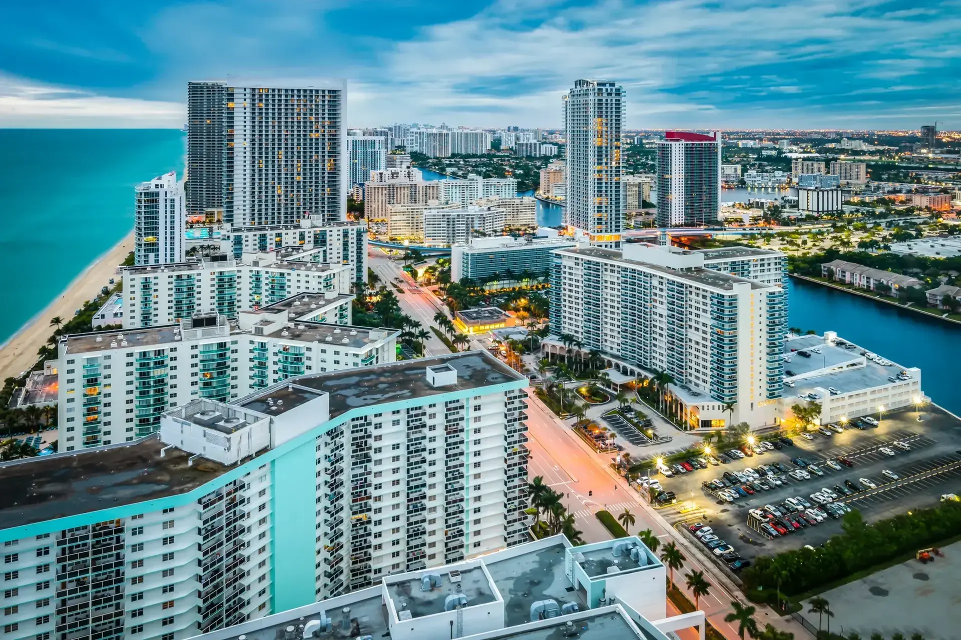 Aerial view of beachfront condo buildings and the Intracoastal in Hollywood, FL