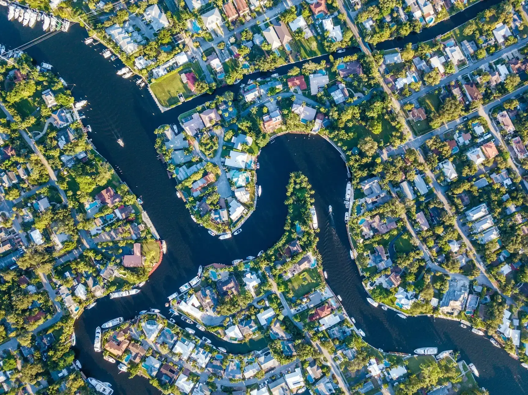 Aerial view of homes along winding canals in Fort Lauderdale
