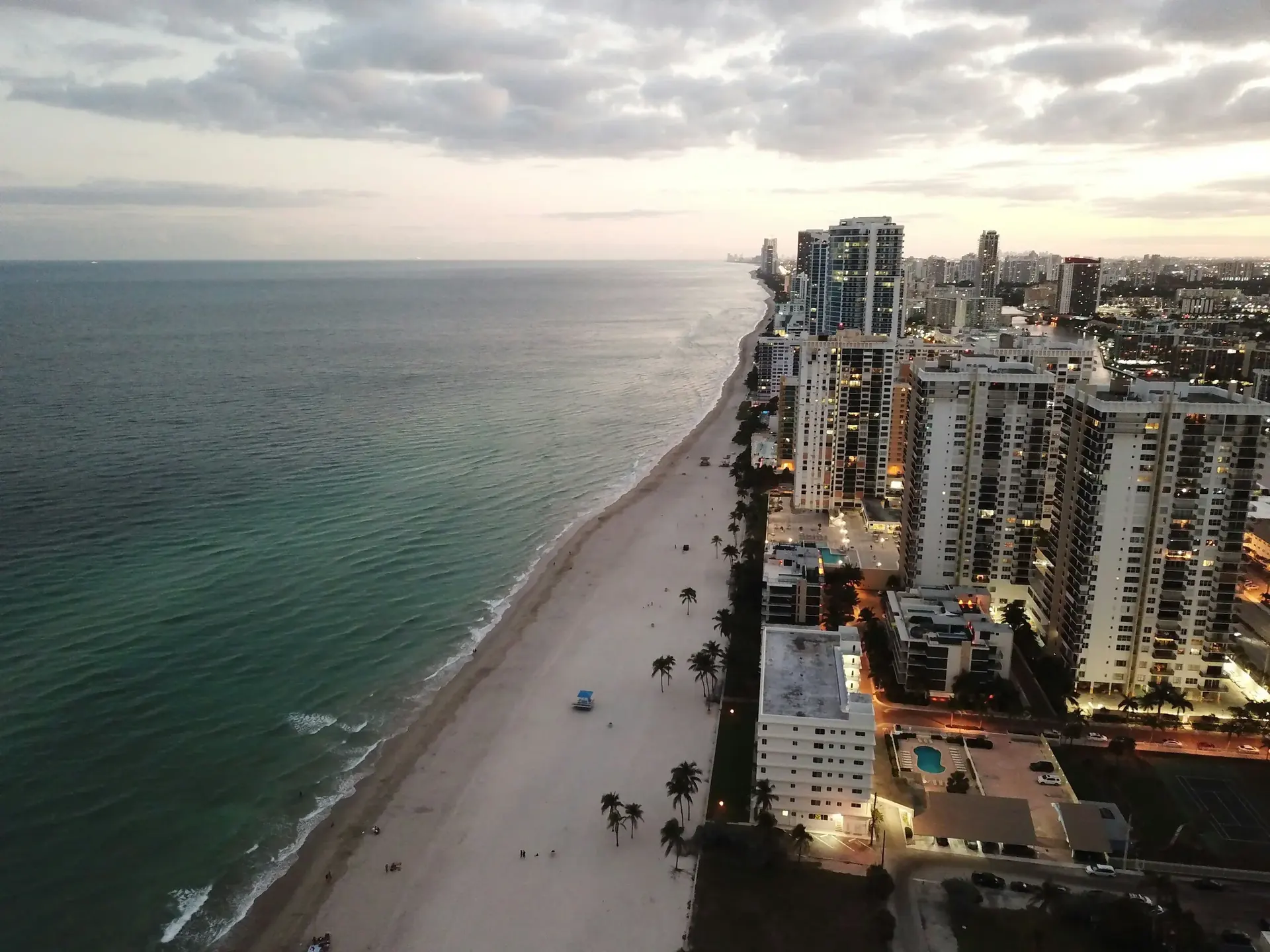 Aerial view of Hallandale Beach shoreline and high-rise buildings