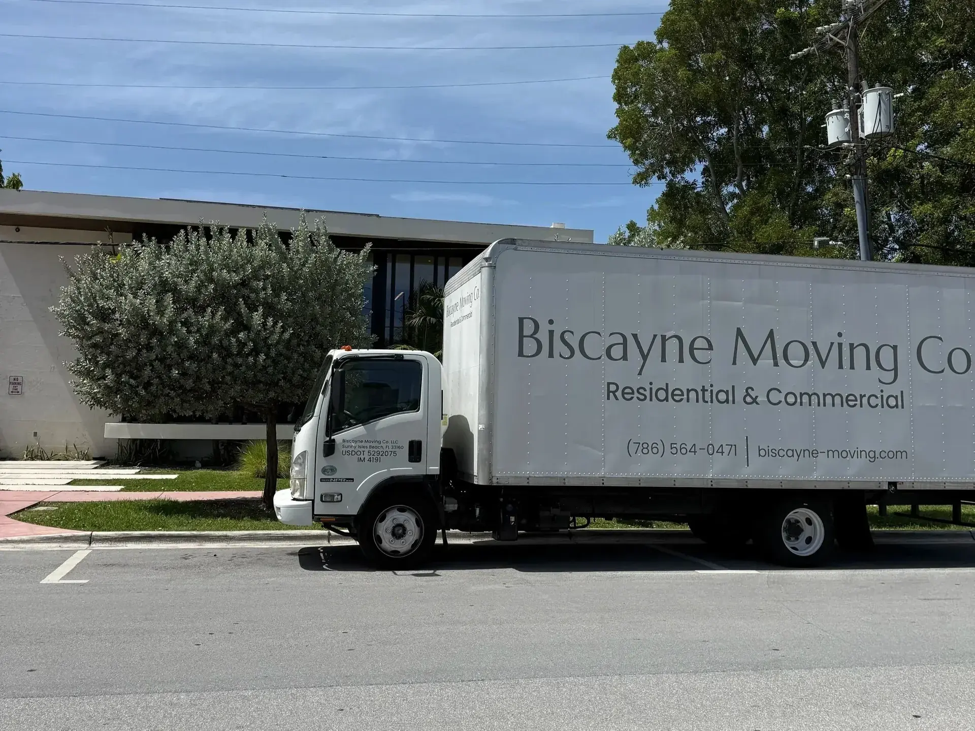 Biscayne Moving Co. truck outside a Miami home for a last-minute moving guide