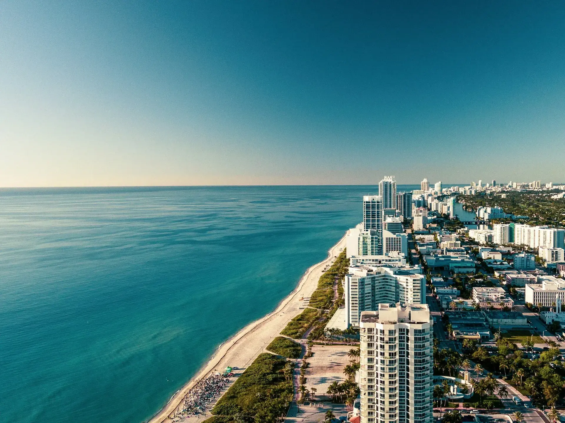 Aerial view of Miami Beach shoreline and high-rise buildings